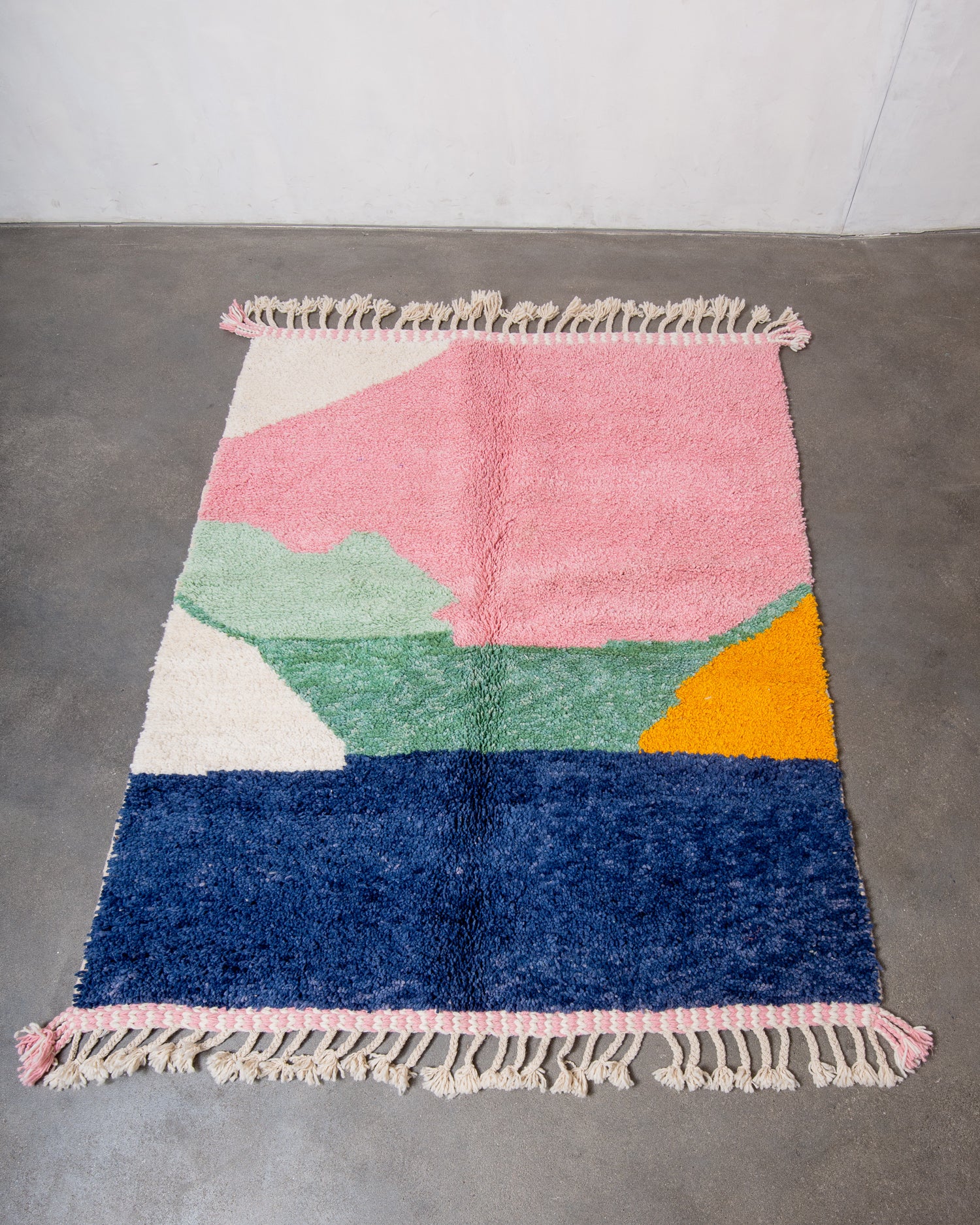 Modern, designer, handcrafted Berber rug from Morocco. Beniourain carpet with beautiful colours and patterns and fluffy wool texture.